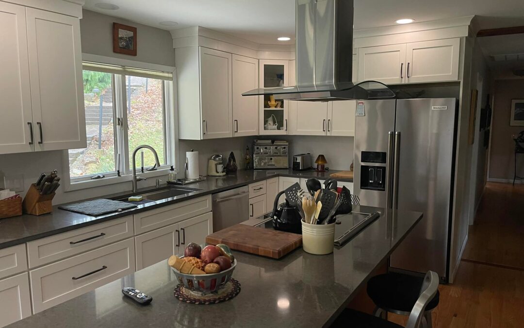 Connecticut kitchen remodel with white shaker cabinets, stainless steel appliances, and quartz countertops by Lagace Construction